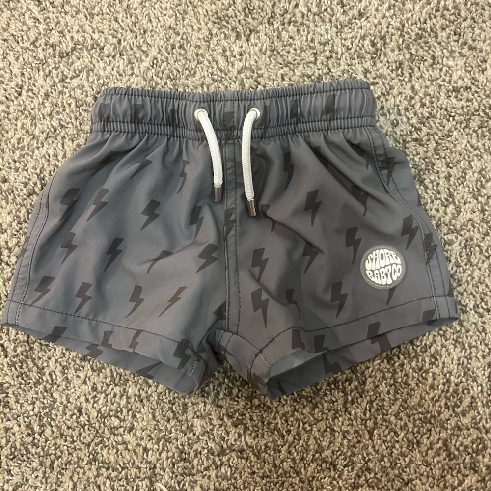 Gray Lightning Print swim trunks baby boy